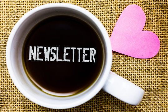 Text sign showing Newsletter. Conceptual photo Bulletin periodically sent to subscribed members News report Tea time coffee cup office typing work jute rough background love heart - Powered by Adobe