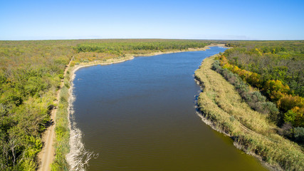 Aerial view on the lake in the middle of the forest. Alexandrovsky forest. Rostov region. Russia