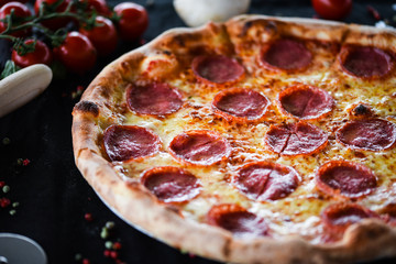 fresh italian pizza diavola with spicy salami, pepperoni & cheese