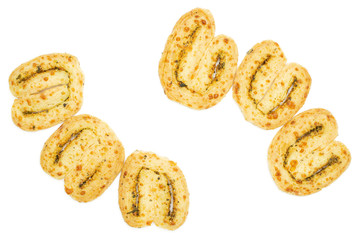 Group of six whole savory cheese palmier flatlay isolated on white background