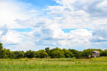 Obraz premium Fluffy clouds over the village