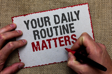 Word writing text Your Daily Routine Matters. Business concept for Have good habits to live a healthy life On jute ground human hand written some texts on red bordered paper