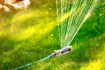 Close up details of automatic lawn circular sprinkler. Details of irrigation