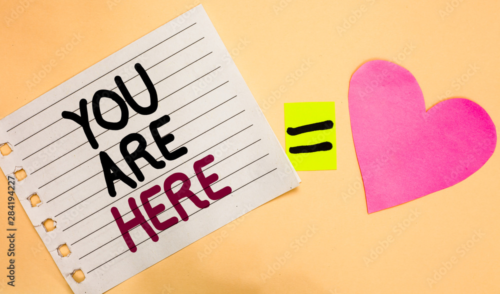 Poster text sign showing you are here. conceptual photo this is your location reference point global positi