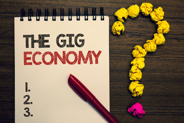 Writing note showing The Gig Economy. Business photo showcasing Market of Short-term contracts...
