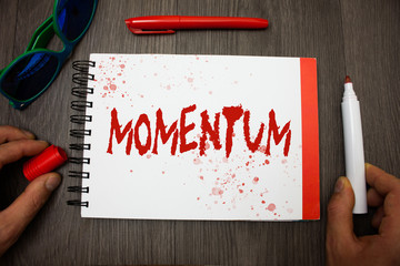 Handwriting text writing Momentum. Concept meaning Quantity motion in moving body Product of mass...