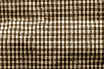 Checked fabric texture in brown tone.