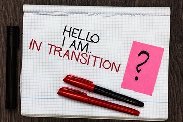 Word writing text Hello I Am.. In Transition. Business concept for Changing process Progressing planning new things Color pen on written notepad with question mark black marker on woody deck