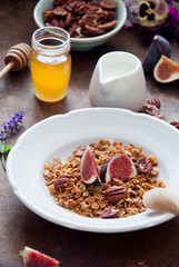 Homemade granola with fresh figs for breakfast