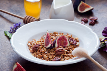 Homemade granola with fresh figs for breakfast