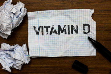 Handwriting text writing Vitamin D. Concept meaning Benefits of sunbeam exposure and certain fat...