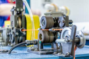 Wire stripping machine. Equipment for cutting wire into size.