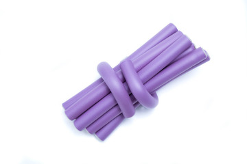 Lilac  hair curlers on a white background