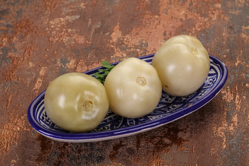 Pickled green tomatoes