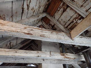 old wooden roof beam structure