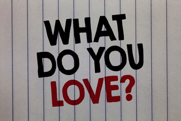 Handwriting text writing What Do You Love question. Concept meaning Enjoyable things passion for something inspiration white vertical paper written three words with black and red color