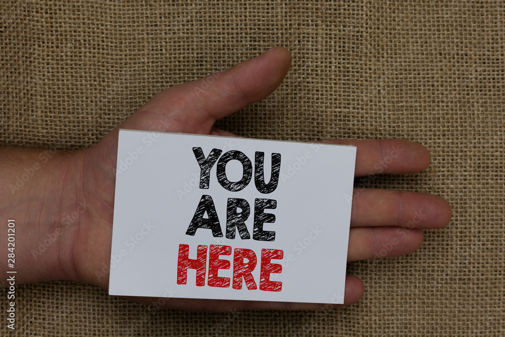 Aufkleber writing note showing you are here. business photo showcasing this is your location reference point g