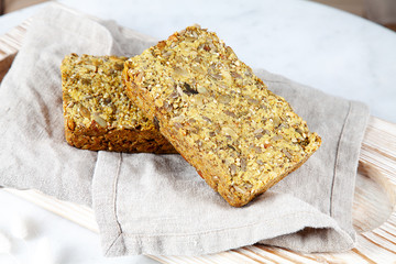 Close up view on grilled toast with bacon and egg on white plate on dark wooden background. Copy space. Food phoro for breakfast. Top view