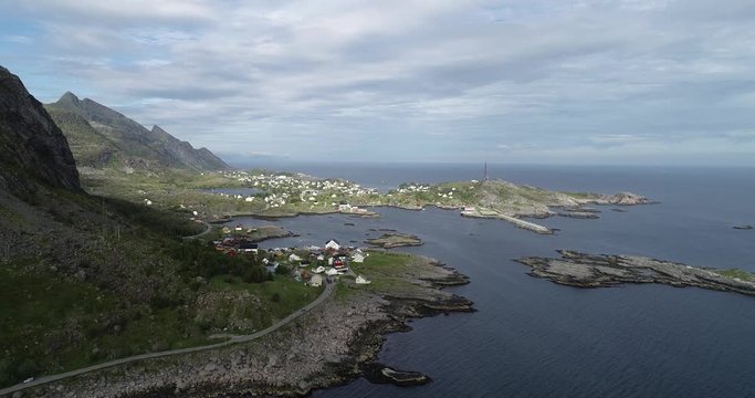 Aerial view of fishing town of Tind on Lofoten islands in Norway, popular tourist destination on sunny summer evening. Aerial 4k Ultra HD.