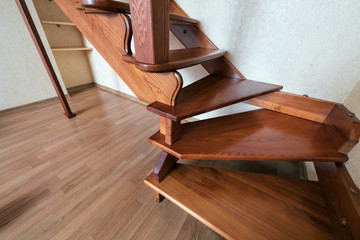 Fototapeta na wymiar Contemporary brown wooden stairs in the house