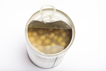 half open peas in brine canned , canned food isolated on white background