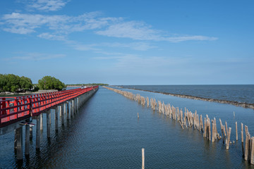 red bridge along the seaside in Thailand