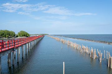 red bridge along the seaside in Thailand