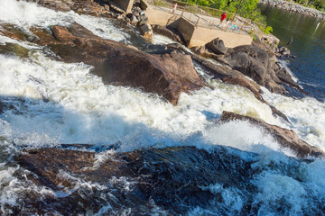 Streams of water rushed to the river from open locks