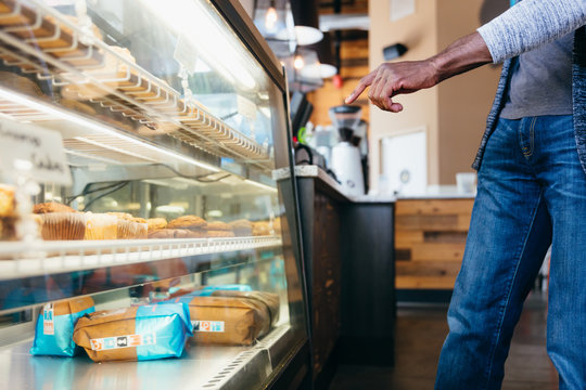 Customer choosing food in cafe