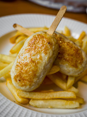child menu - french fries and chicken cutlets in the form of popsicle