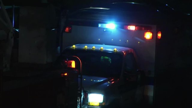 The blinking strobes of an ambulance