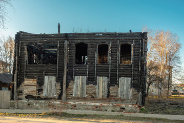 Abandoned wooden building after fire