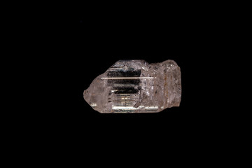 macro mineral stone Topaz on a black background
