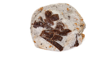 macro mineral stone Staurolite on a white background