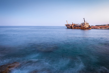 Fototapeta na wymiar Abandoned rusty ship Edro III near Pegeia, Paphos, Cyprus at sunrise