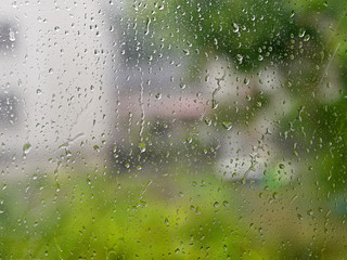 Rain drops on window viewed from interior.
