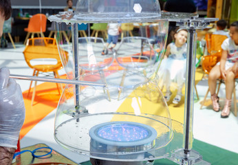 Children's party. To burst the soap bubble . Soap bubbles show.