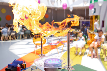 Children's party. To burst the soap bubble . Soap bubbles show.