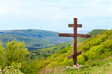 Cross on the trail to the Christian Orthodox cave monastery. Mangup Kale. Crimea.