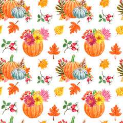 Festive autumn seamless pattern with watercolor orange pumpkins, mums flowers, colorful tree leaves and berries, isolated on white background. Decorative fall botanical art print for holiday design.
