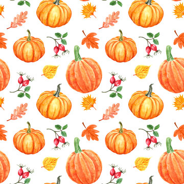 Watercolor autumn seamless pattern with orange pumpkins, colorful tree leaves and red berries. Fall symbols, isolated on white background. Decorative botanical art print for holiday design.