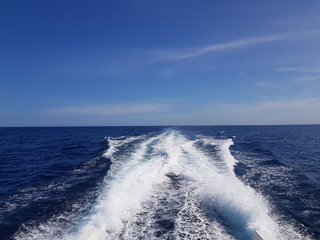 Fototapeta premium speed boat waves in open waters