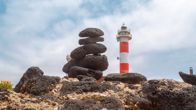 15-07-2019 Fuerteventura, Spain: Visiting the lighthouse in the eastern part of the island, where you can play with the environment to get creative photographs, for example, a piece of rusty boat.