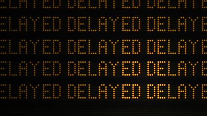 A Close Up Of The Word Delayed As It Appears Multiple Times On A Sign At A Station Or Airport Or Highway