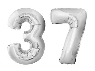 Number 37 thirty seven made of silver inflatable balloons isolated on white background. Chrome silver helium balloons forming 37 thirty seven. Birthday concept