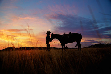 Wyoming Cowgirl at Sunrise