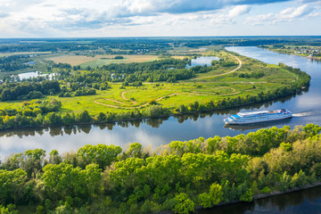 The Volga River, Russia. Tourist steamer floating on the Volga river channel, view from the quadcopter