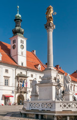 Fototapeta na wymiar The beautiful Main square of Maribor, Slovenia, known as Glavni Trg, on a sunny day