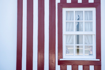 Red striped house, traditional house of Aveiro. Fisherman's village Costa Nova. Aveiro. Portugal.