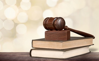 Justice Scales and books and wooden gavel on table. Justice concept
